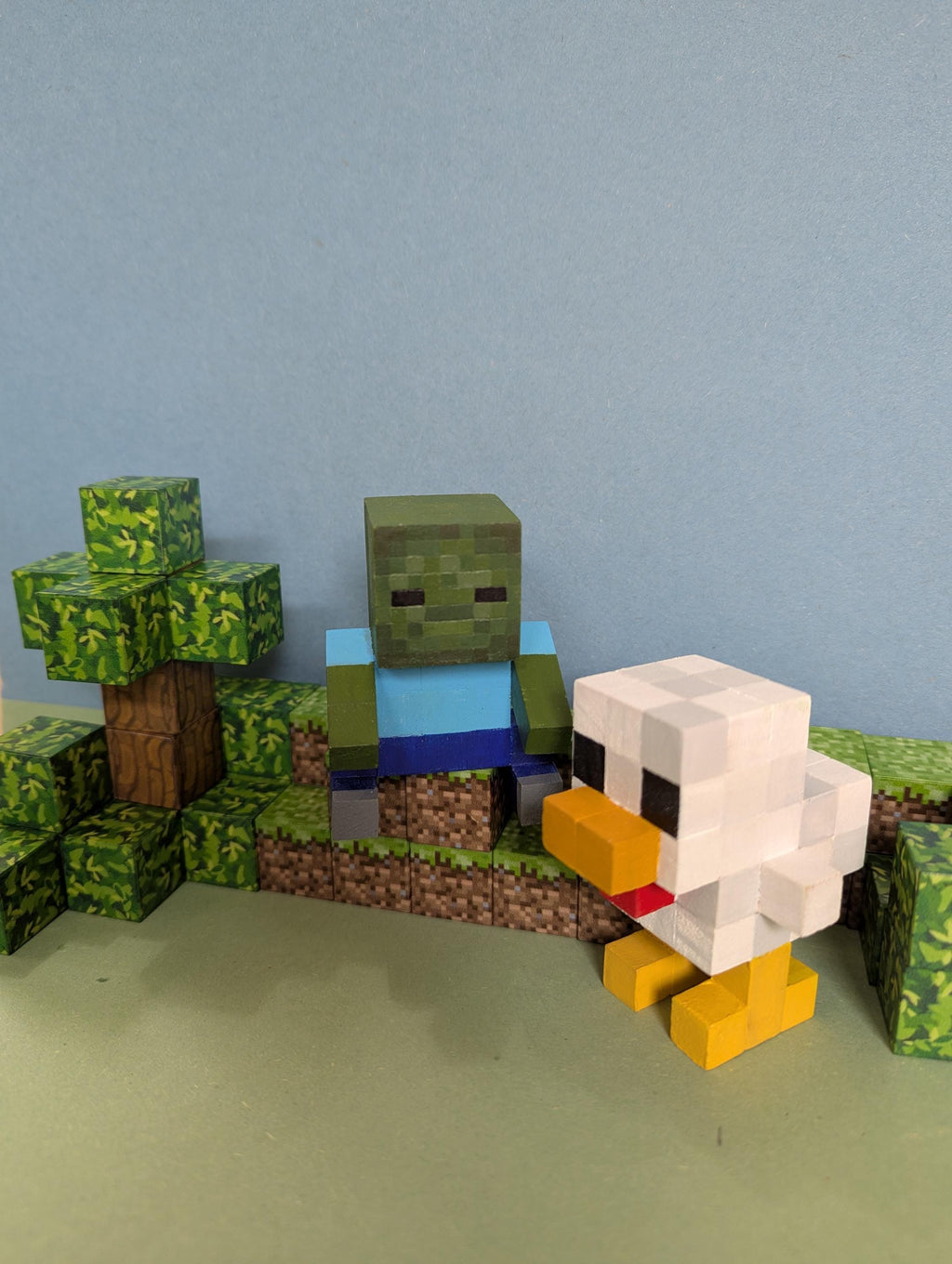 Chicken Jockey inspired by A Minecraft Movie. Wooden block hand painted baby zombie and chicken.