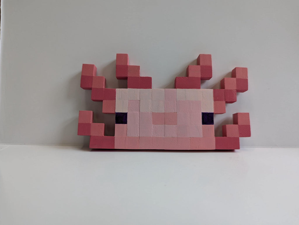 Wooden block Minecraft inspired hand painted Axolotl face.