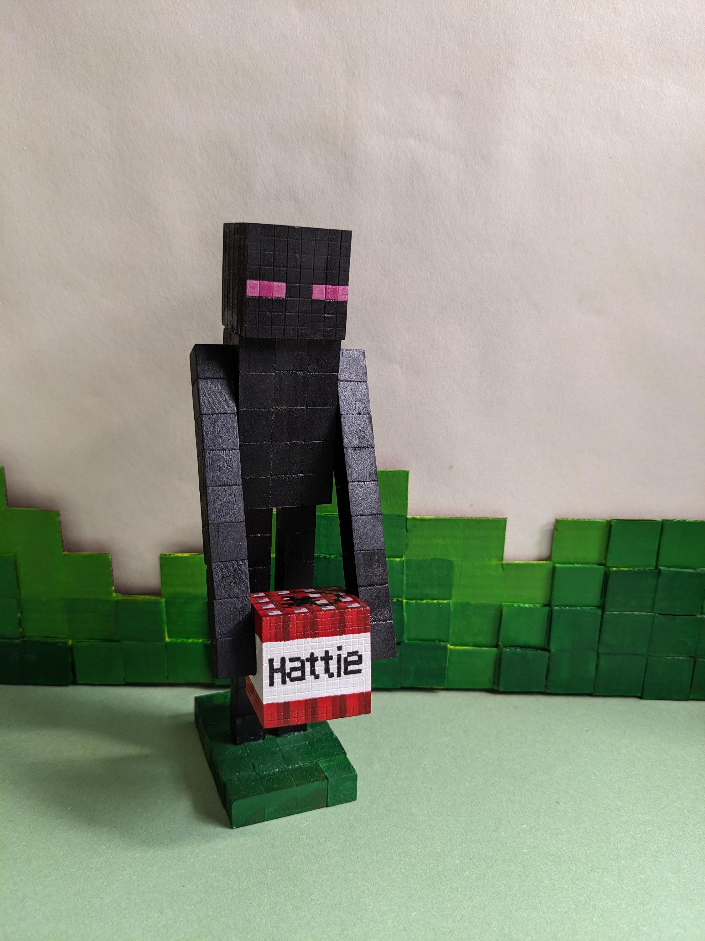 Enderman holding a personalised TNT block