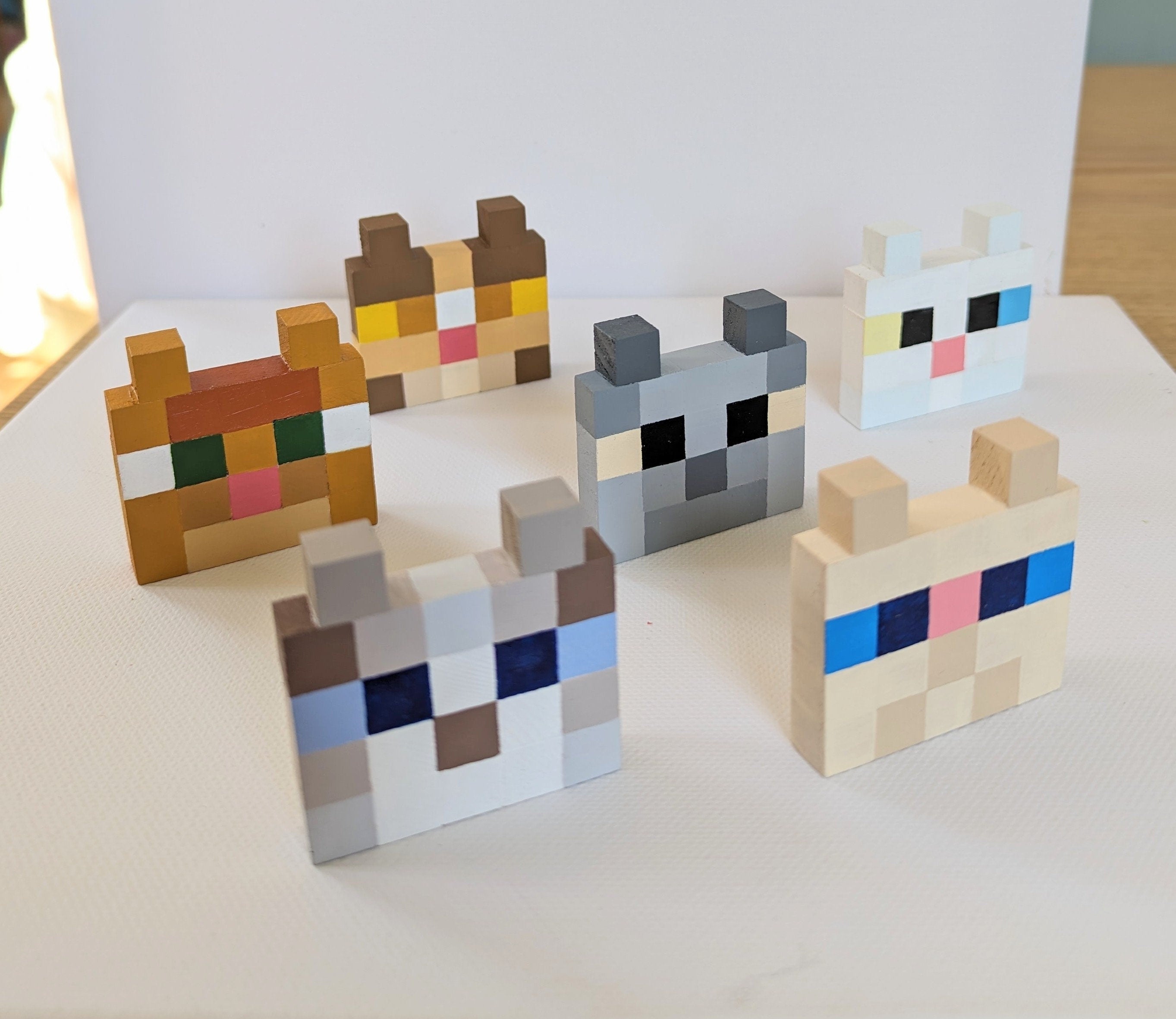 Cat faces. Choose your favourite Minecraft cats and give them a cozy home.