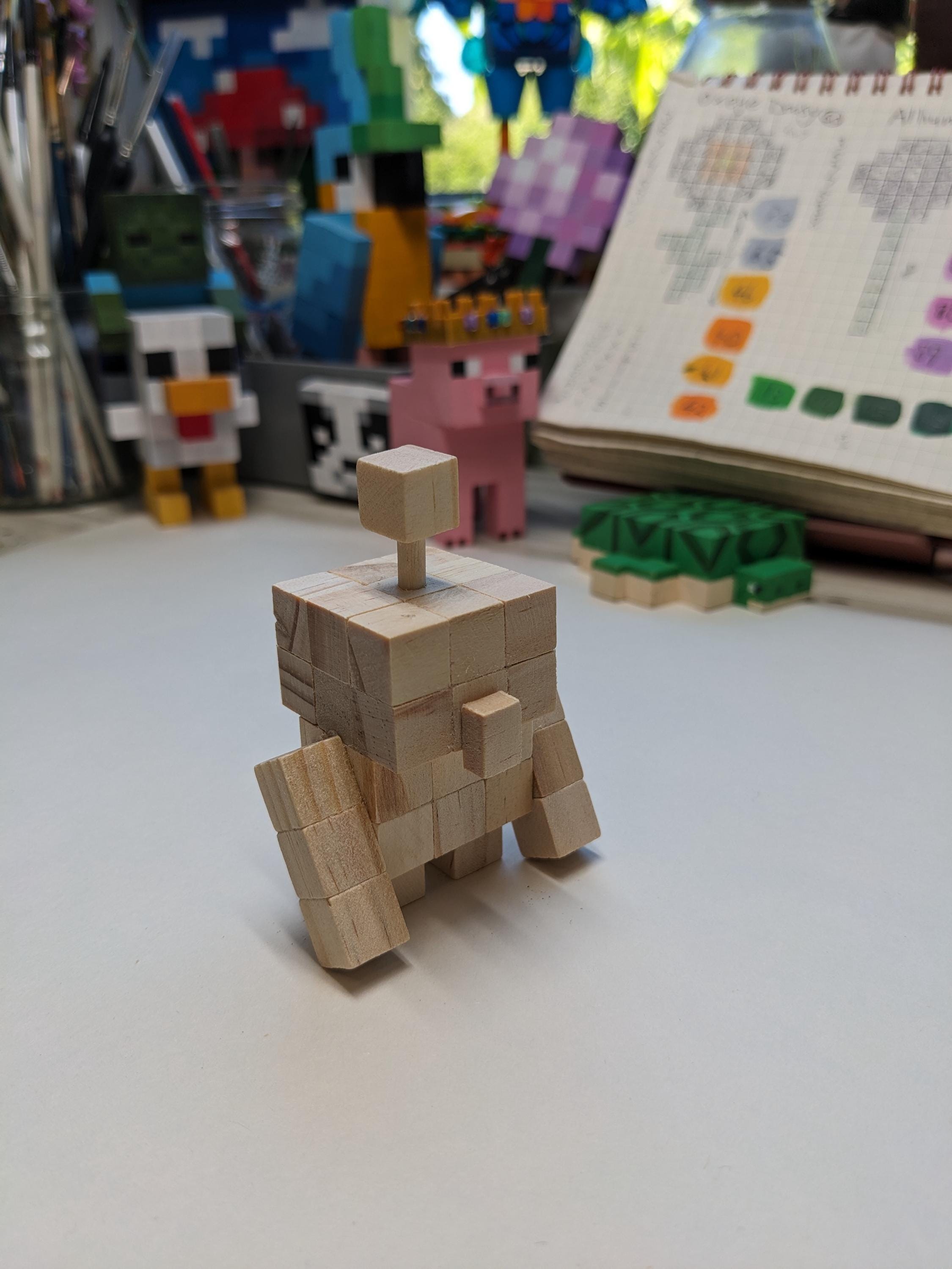 Copper Golem made from wooden blocks. Hand painted and now you can spin his head round.