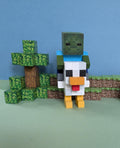 Chicken Jockey inspired by A Minecraft Movie. Wooden block hand painted baby zombie and chicken.
