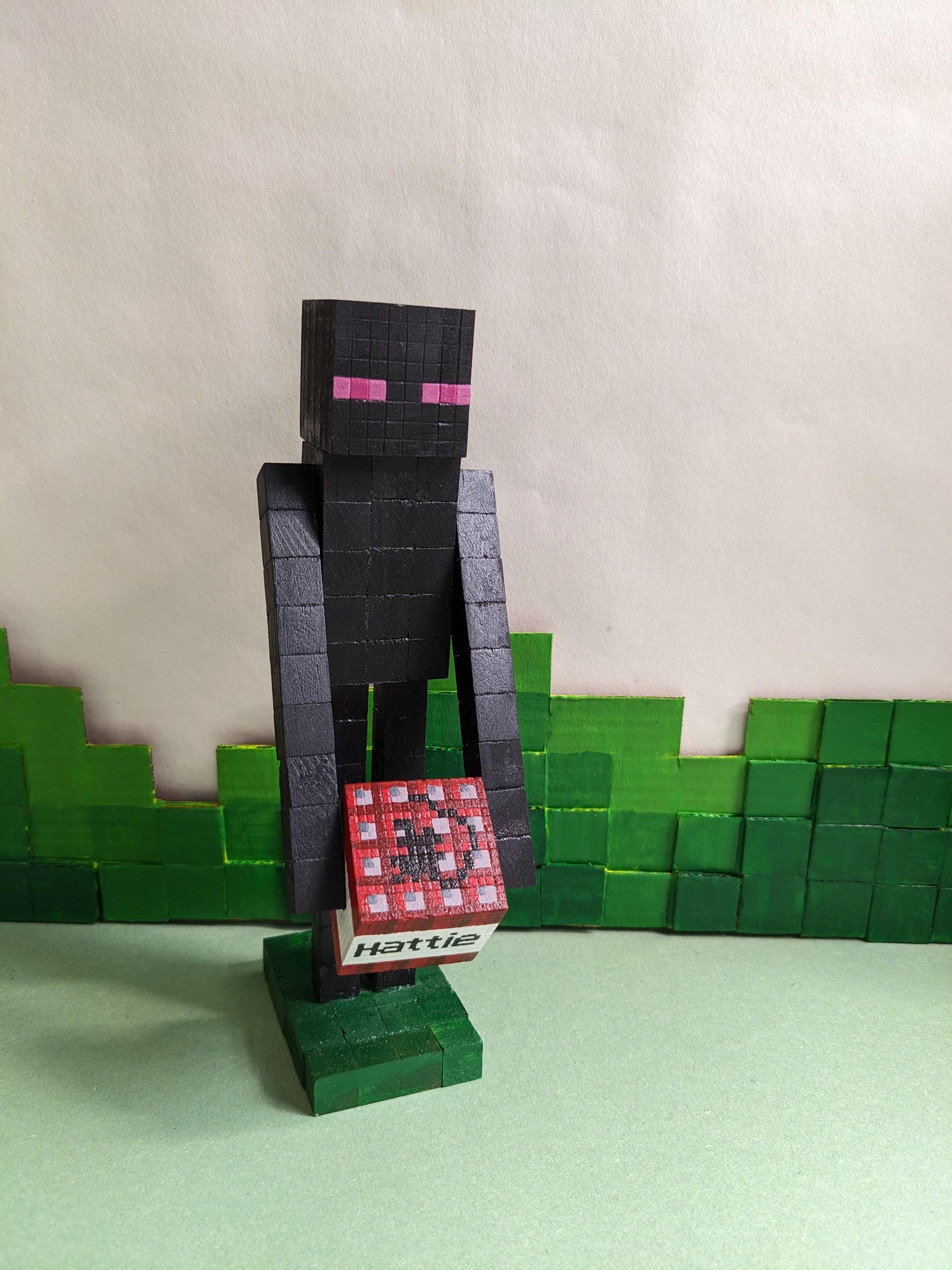 Enderman holding a personalised TNT block